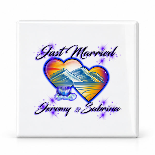 E017 Hearts Waterfall Mountain Sunset ceramic coaster by Mythic Airbrush, original Air-Volution design — main image