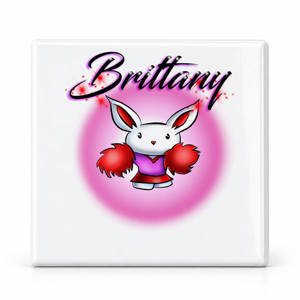 G009 Cheerleader Rabbit ceramic coaster by Mythic Airbrush, original Air-Volution design — main image