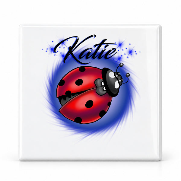 I007 Ladybug ceramic coaster by Mythic Airbrush, original Air-Volution design — main image